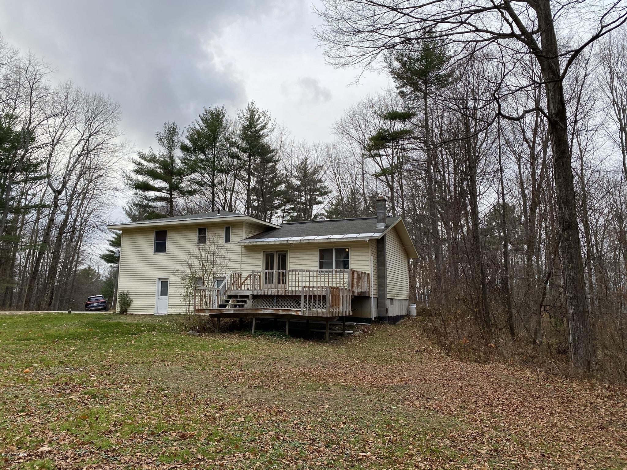 311 Swamp Road Richmond, MA 01201 - Photo 15 of 42 a front view of a house with a yard