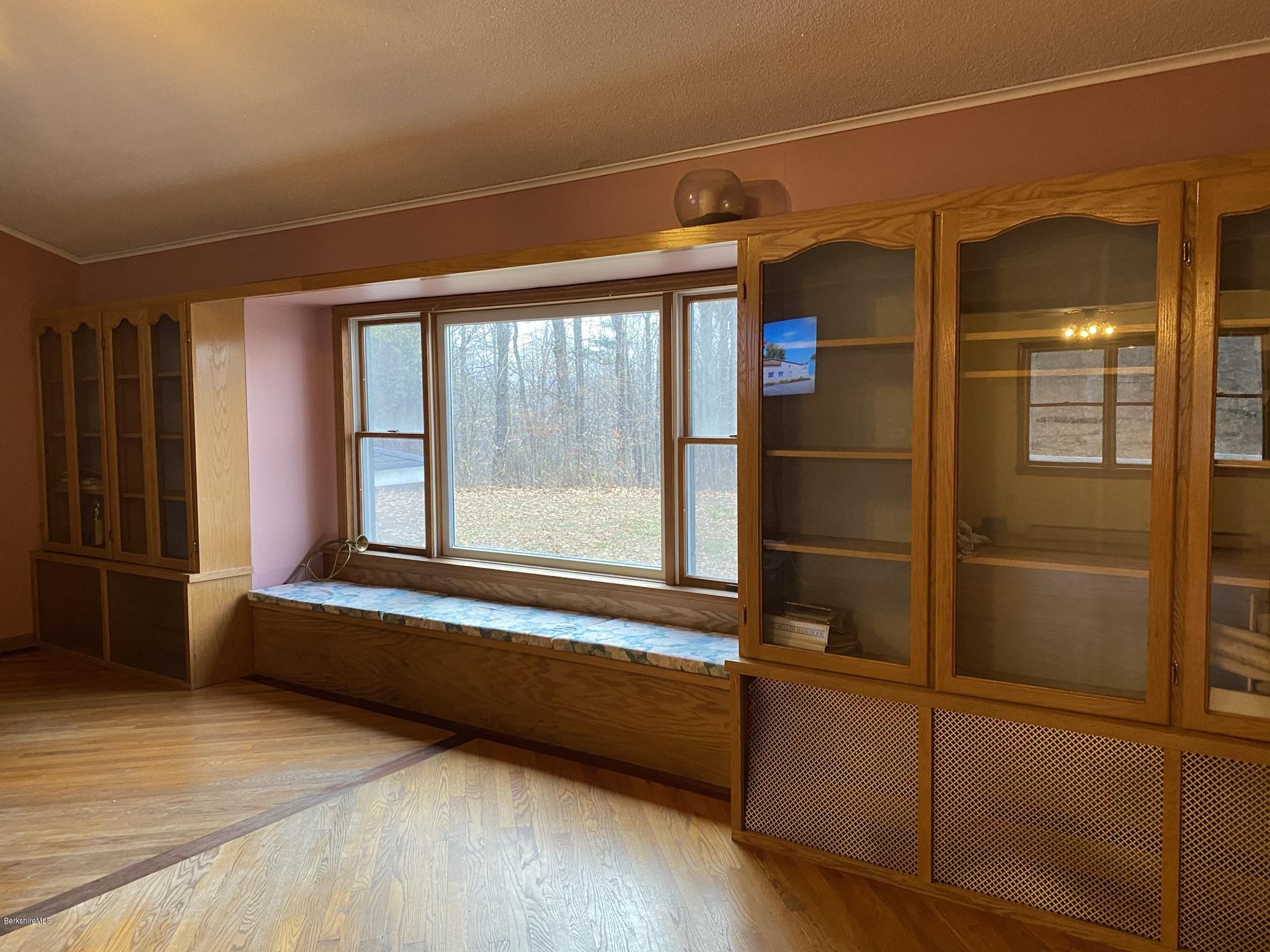 311 Swamp Road Richmond, MA 01201 - Photo 26 of 42 a view of a room with wooden floor and a window