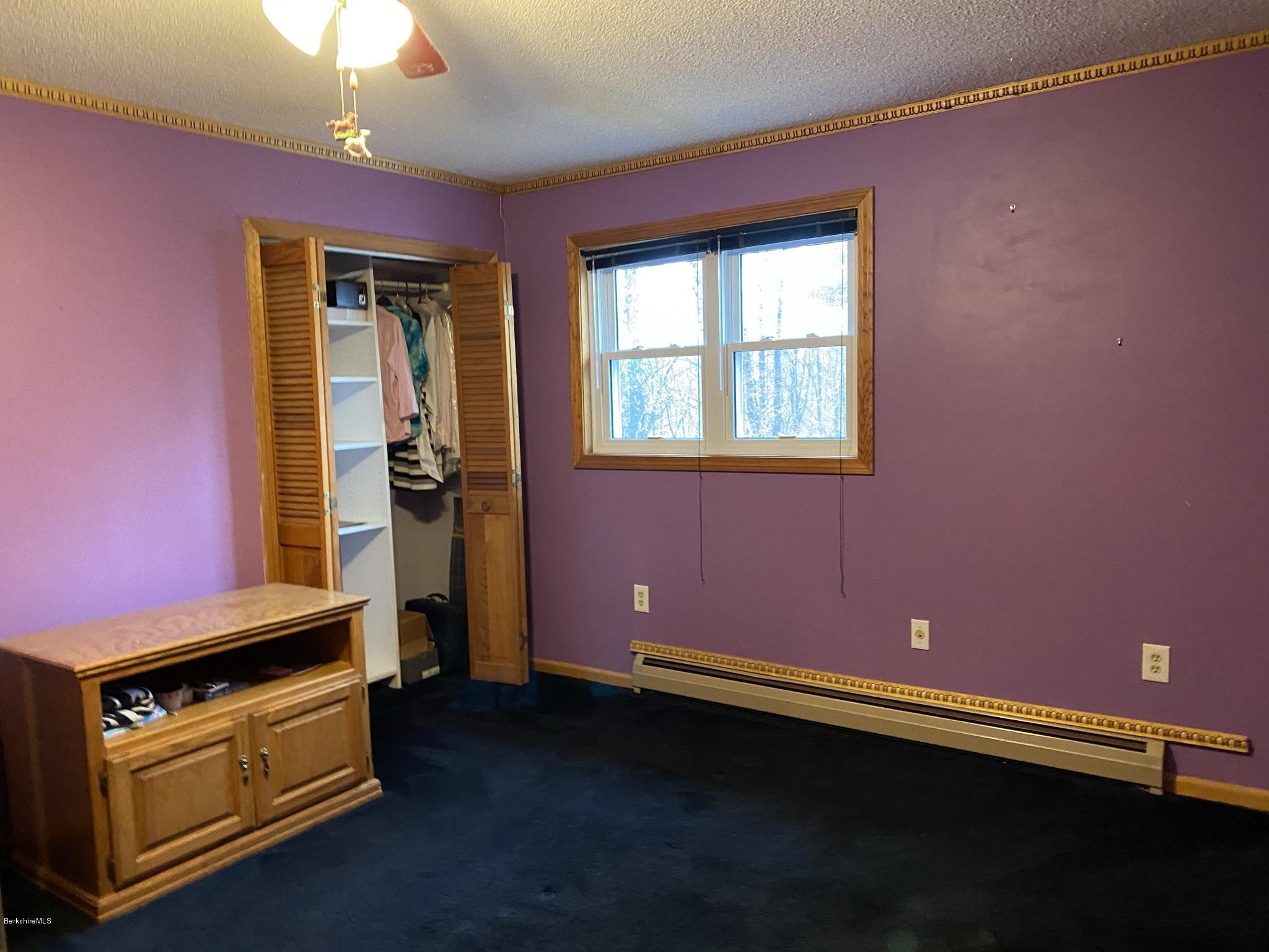 311 Swamp Road Richmond, MA 01201 - Photo 37 of 42 a view of an empty room with a window