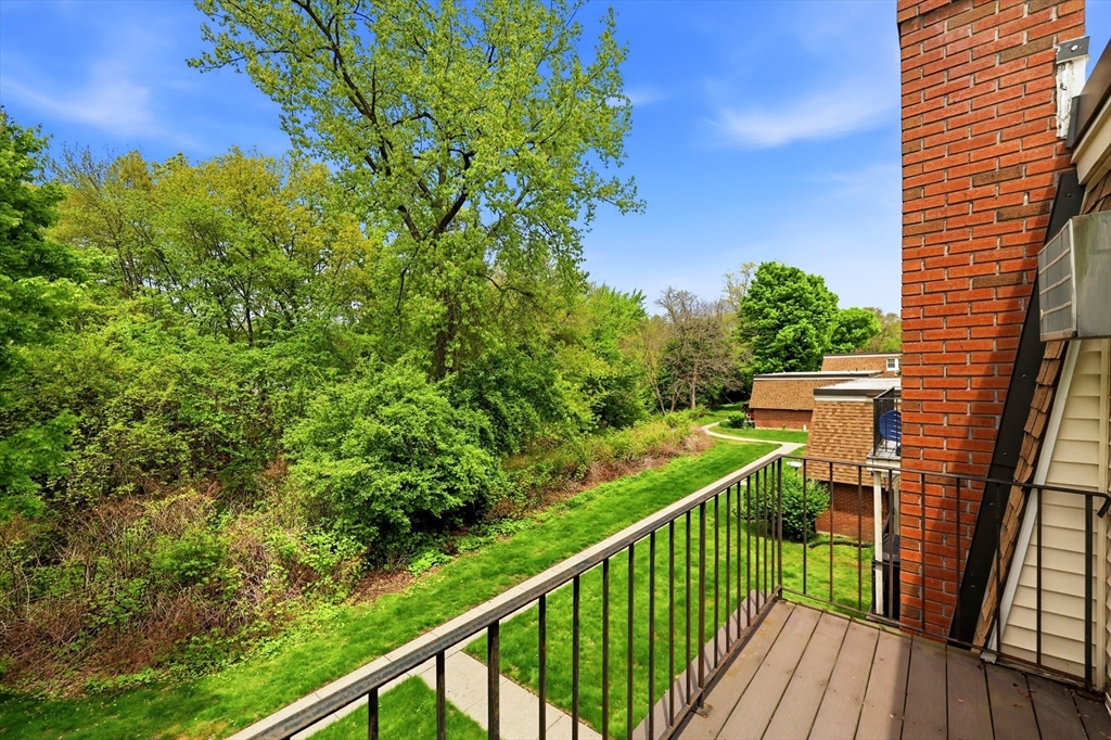 80 Damon Road, Unit 2303 Northampton, MA 01060 - Photo 3 of 23 a view of a balcony with an outdoor space