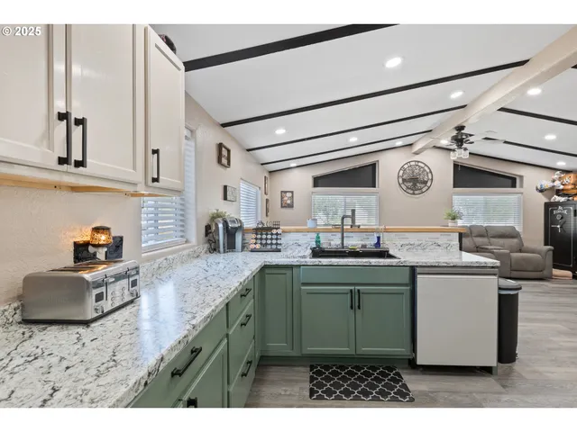a bathroom with a sink double vanity and a mirror