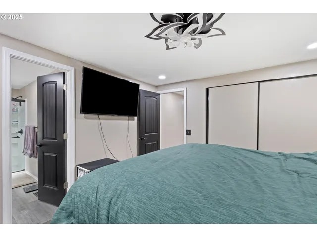 a view of a livingroom with a flat screen tv