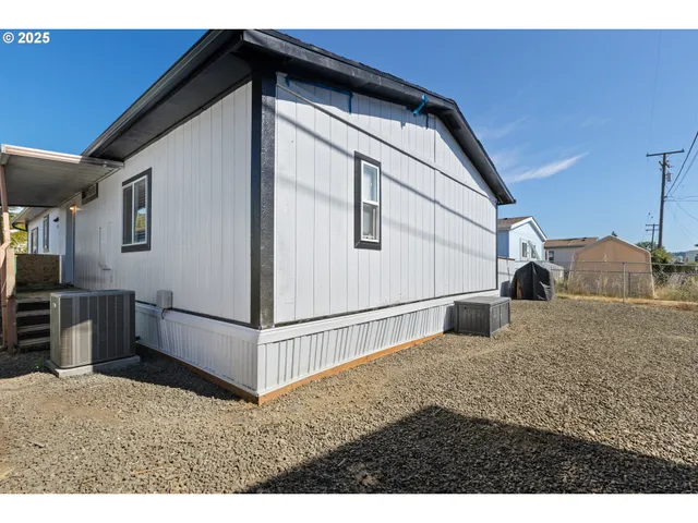 a view of livingroom with furniture and cabinet