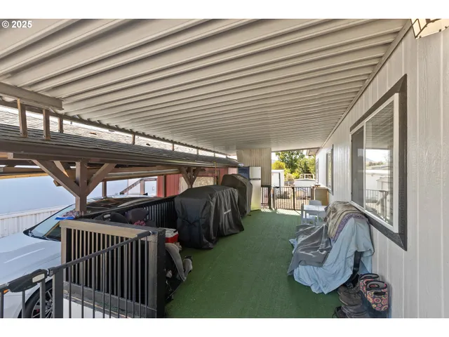 a view of a porch with furniture