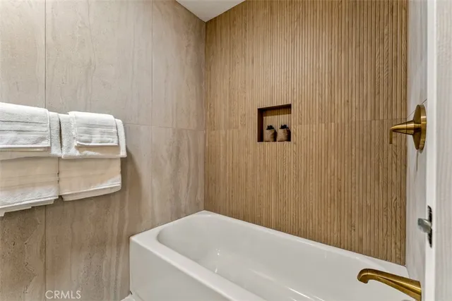 a bathroom with a bathtub