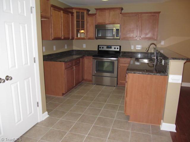 202 Ridge Landing Road Archdale, NC 27263 - Photo 5 of 16 Kitchen. Ceramic Tile Floor