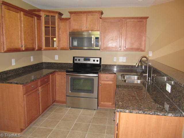 202 Ridge Landing Road Archdale, NC 27263 - Photo 6 of 16 Kitchen. Granite Countertops, Stainless Appliances