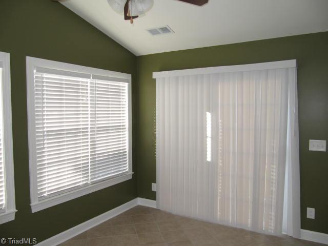 202 Ridge Landing Road Archdale, NC 27263 - Photo 9 of 16 Sunroom. Ceramic Tile, Vaulted Ceiling