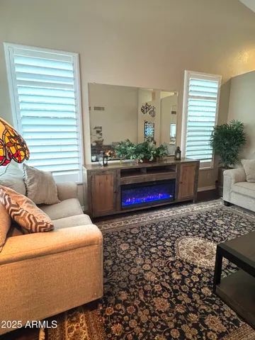 a living room with a couch and a table