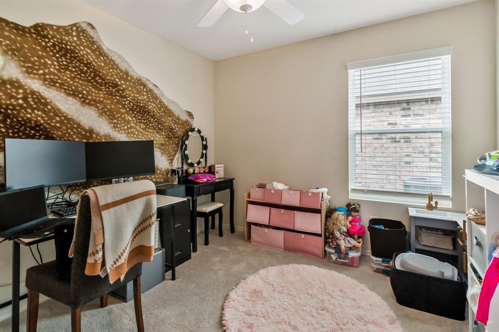 1228 Viscount Street Haslet, TX 76052 - Photo 20 of 28 a view of a workspace with furniture and a window
