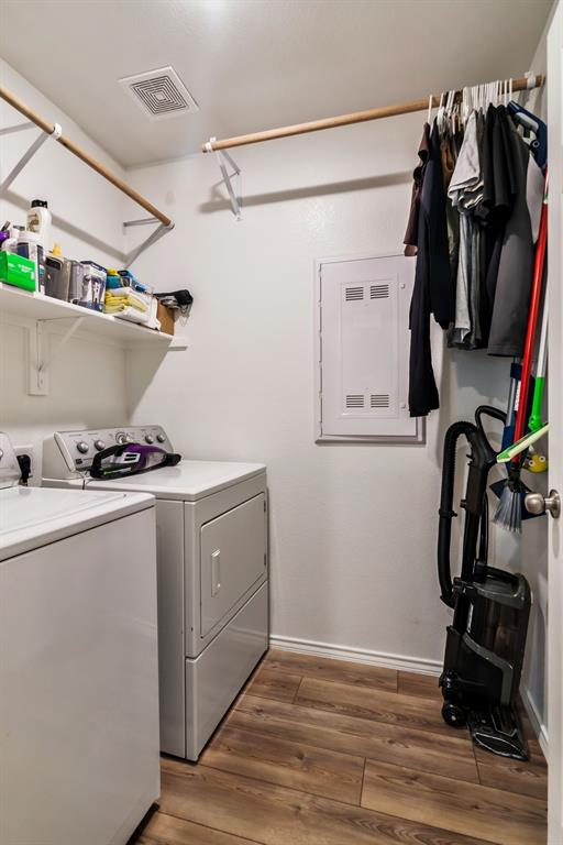 1228 Viscount Street Haslet, TX 76052 - Photo 22 of 28 a view of walk in closet with clothes and shoes