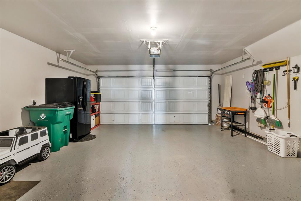 1228 Viscount Street Haslet, TX 76052 - Photo 23 of 28 a view of a room with gym equipment