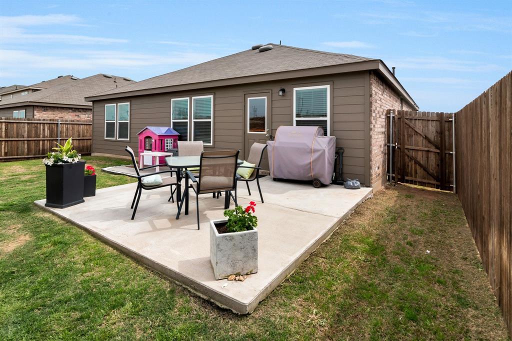 1228 Viscount Street Haslet, TX 76052 - Photo 25 of 28 a view of two chairs in patio