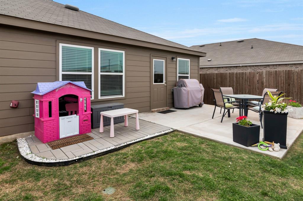 1228 Viscount Street Haslet, TX 76052 - Photo 27 of 28 a view of a chairs in patio