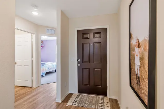 a view of a living room and dining room