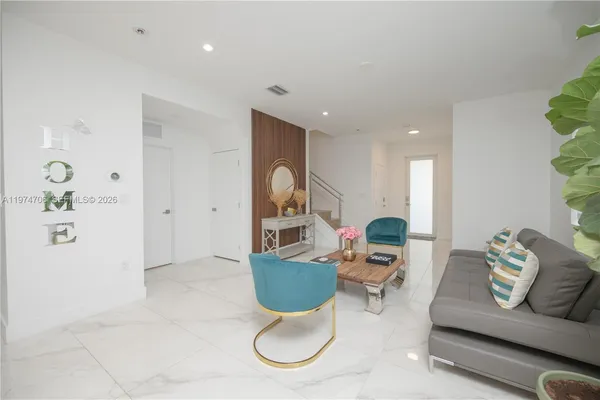 a view of a dining room with furniture