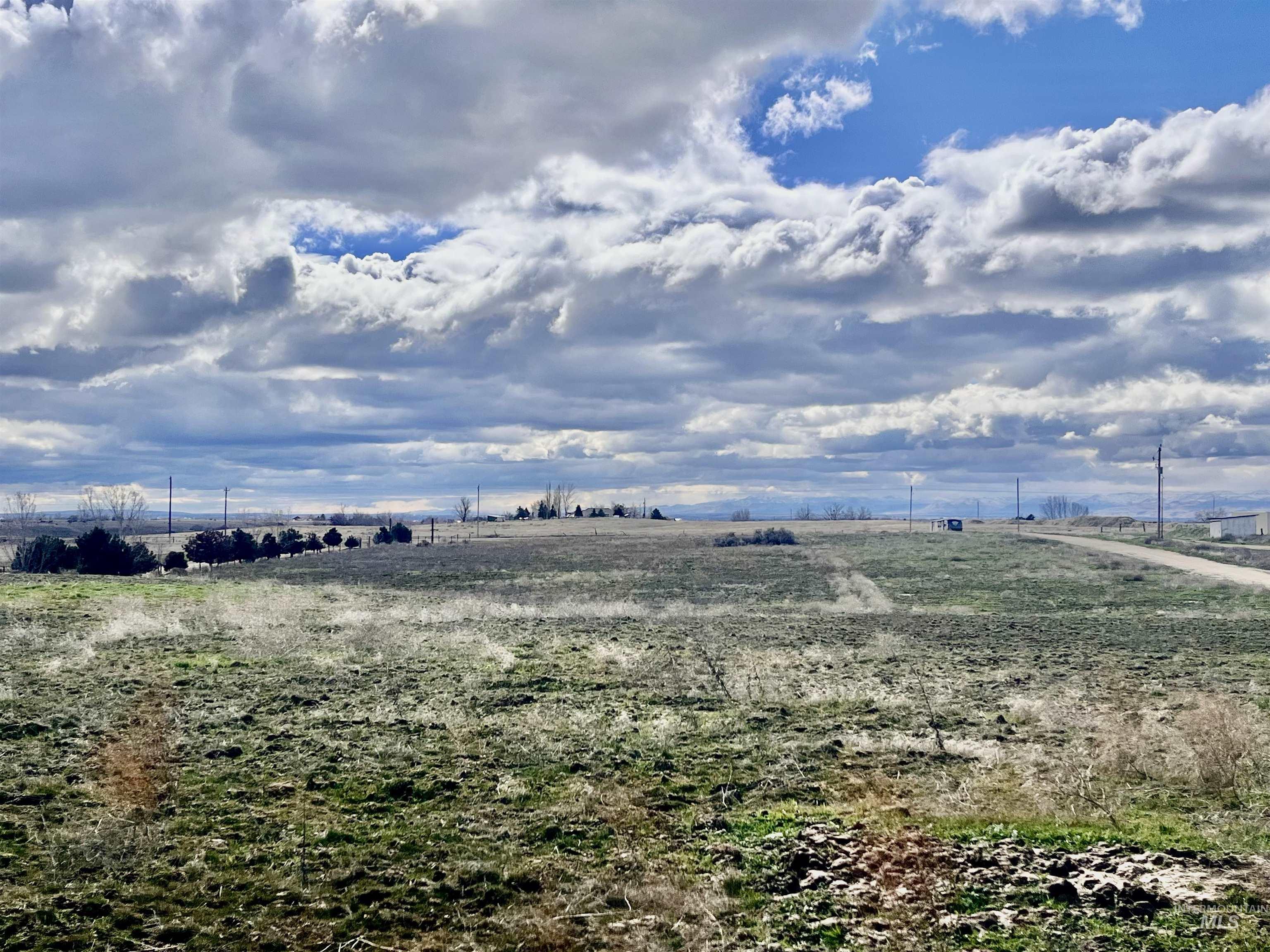 13488 Hollow Road Caldwell, ID 83607 - Photo 11 of 15 View of yard featuring a view of rural / pastoral area