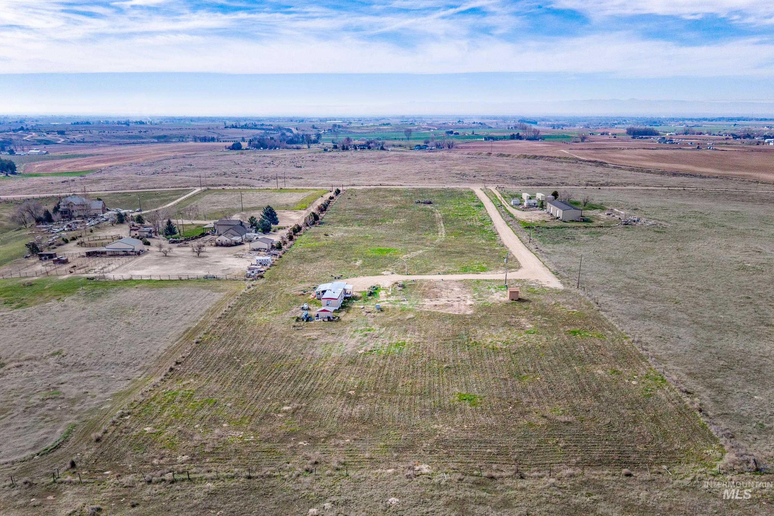 13488 Hollow Road Caldwell, ID 83607 - Photo 3 of 15 View of rural area featuring farmland