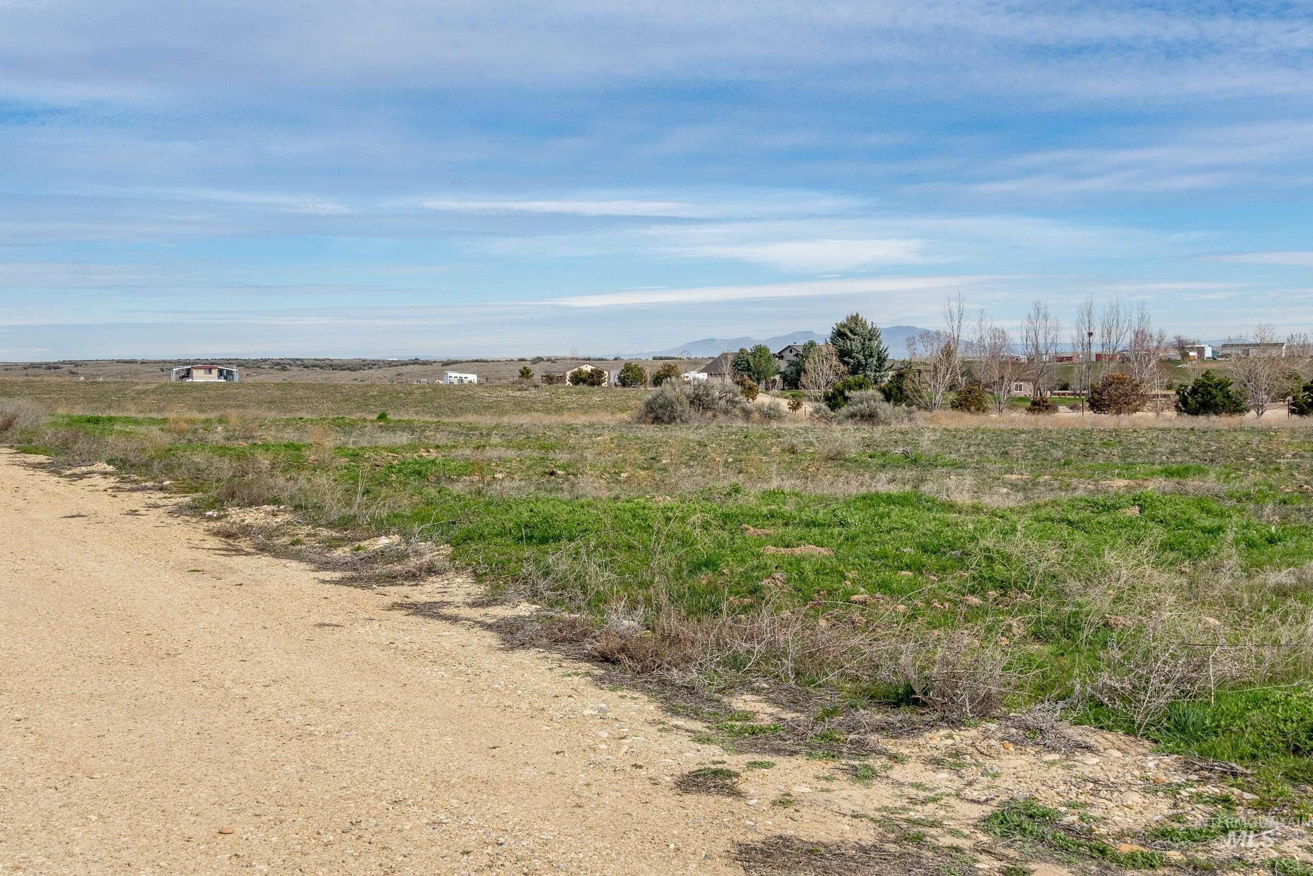 13488 Hollow Road Caldwell, ID 83607 - Photo 9 of 15 View of nature featuring rural landscape and mountains