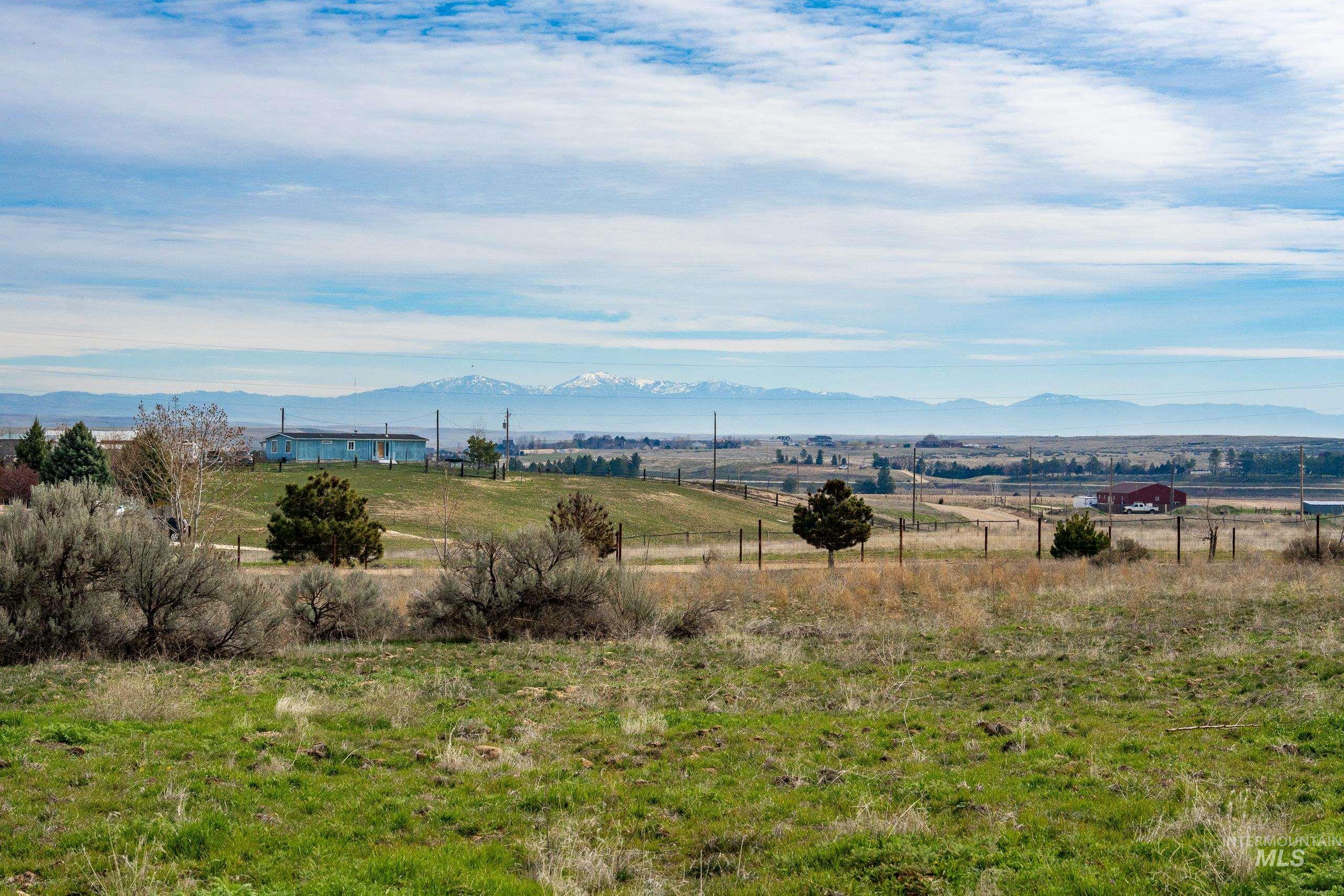13488 Hollow Road Caldwell, ID 83607 - Photo 10 of 15 View of mountain backdrop with rural landscape