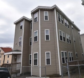 73 Hamilton Street Boston, MA 02125 - Photo 15 of 21 a front view of a house with a yard