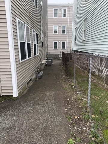 73 Hamilton Street Boston, MA 02125 - Photo 17 of 21 a view of a house with backyard