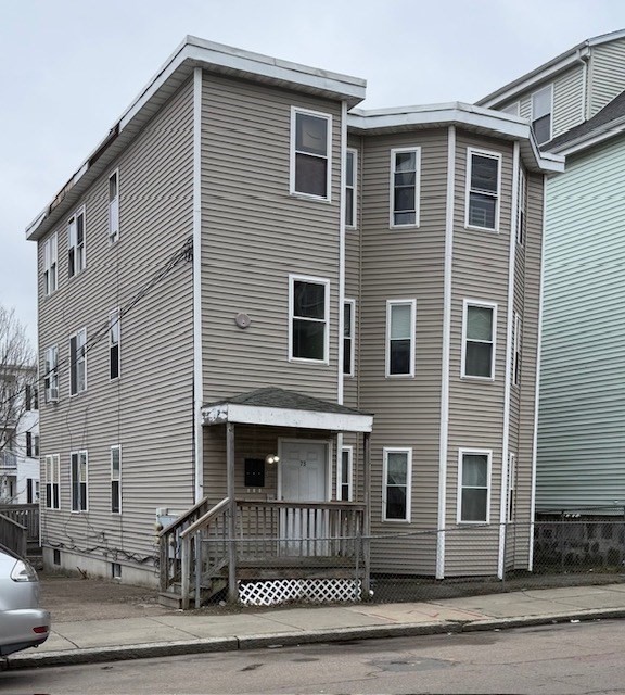 73 Hamilton Street Boston, MA 02125 - Photo 19 of 21 a front view of a house with a garage