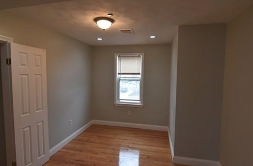 73 Hamilton Street Boston, MA 02125 - Photo 10 of 21 a view of an empty room and window