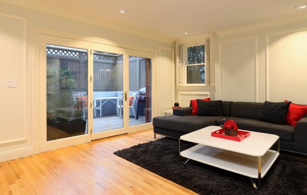 a living room with furniture and a rug
