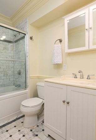 159 St Botolph Street, Unit 1 Boston, MA 02115 - Photo 6 of 8 a bathroom with a toilet sink and shower