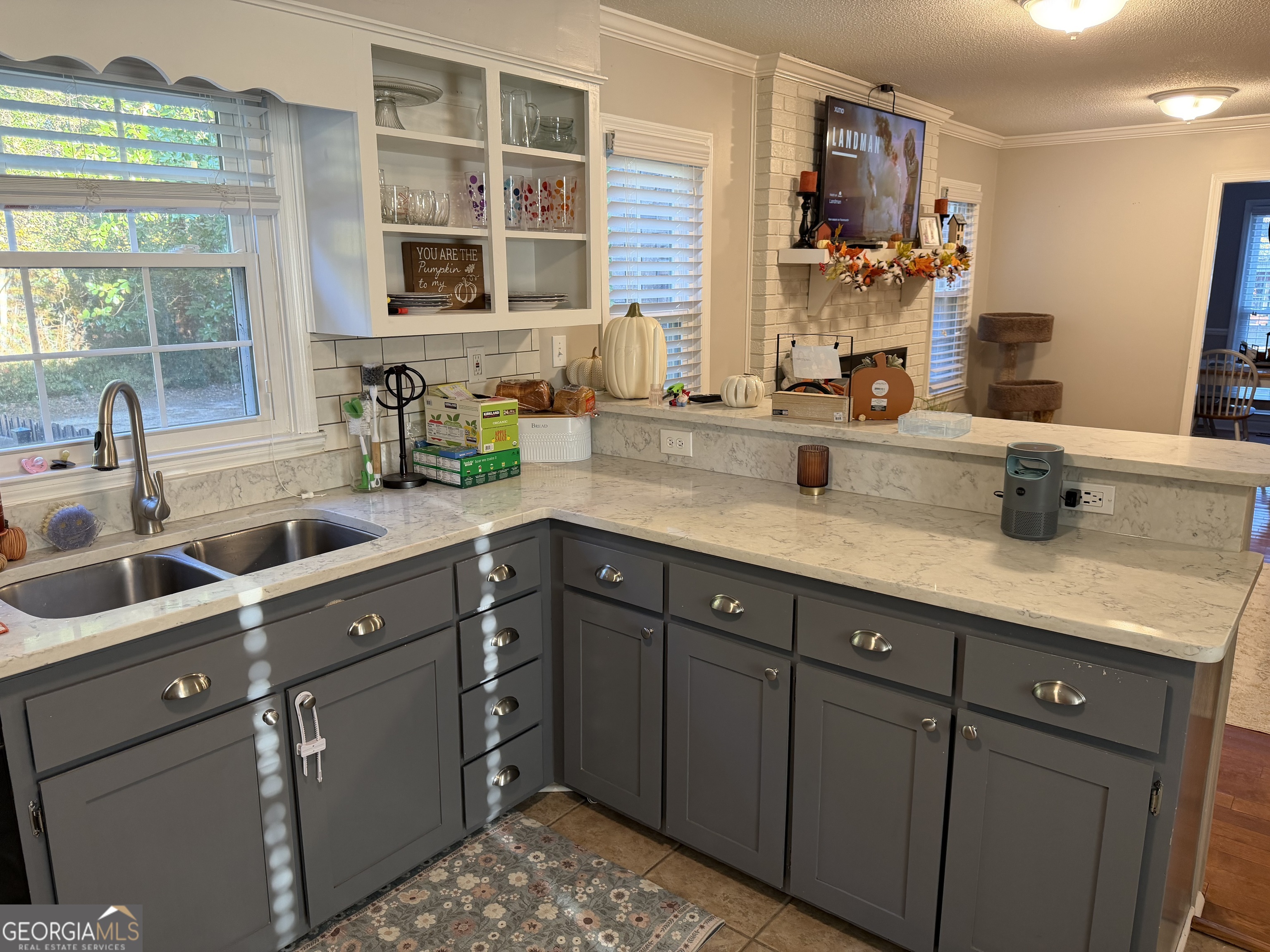 504 Payne Place Dublin, GA 31021 - Photo 11 of 22 a kitchen with cabinets and window