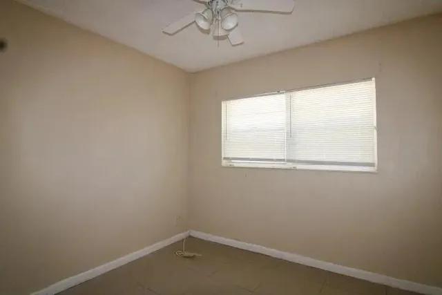 an empty room with a window