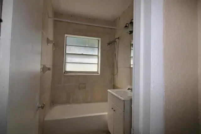 a bathroom with a bathtub