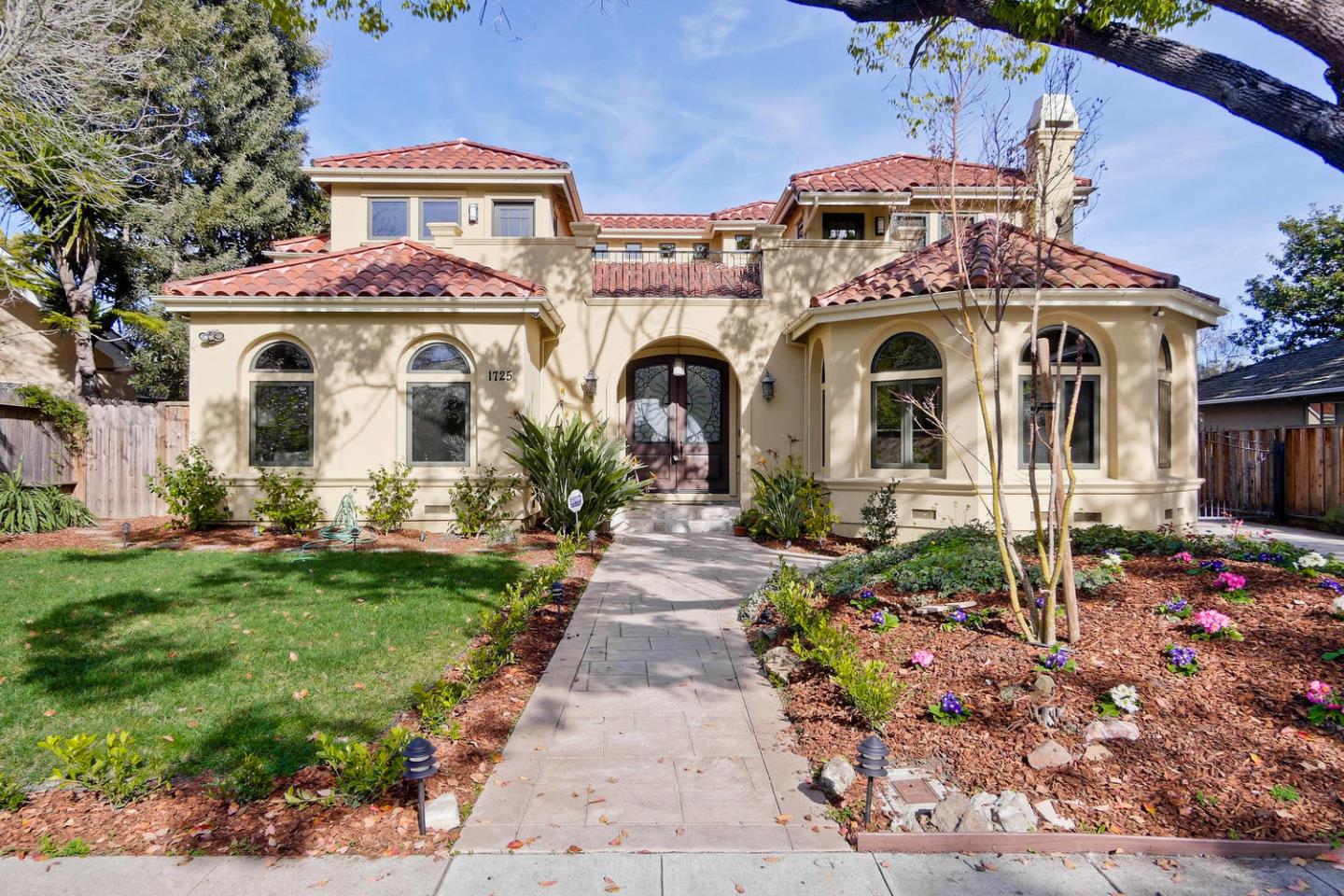 1725 Newell Road Palo Alto, CA 94303 - Photo 1 of 47 a front view of a house with garden