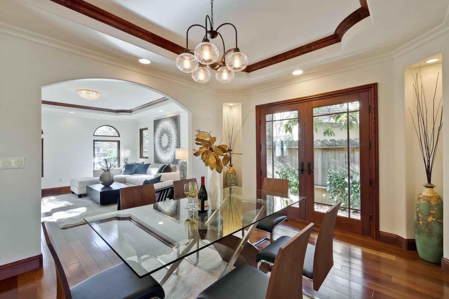 1725 Newell Road Palo Alto, CA 94303 - Photo 13 of 47 a view of a dining room with furniture window and wooden floor
