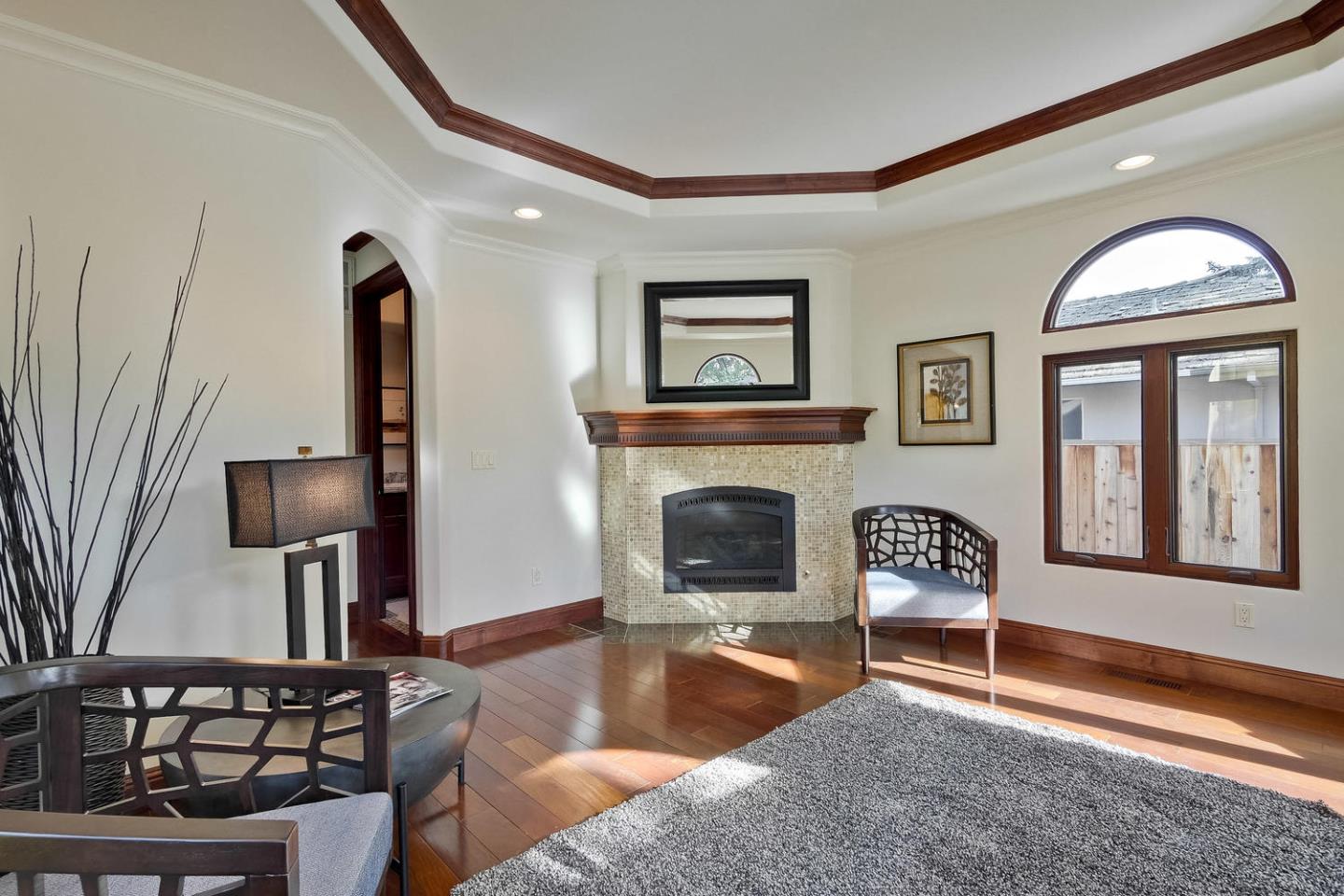 1725 Newell Road Palo Alto, CA 94303 - Photo 19 of 47 a living room with furniture and a fireplace