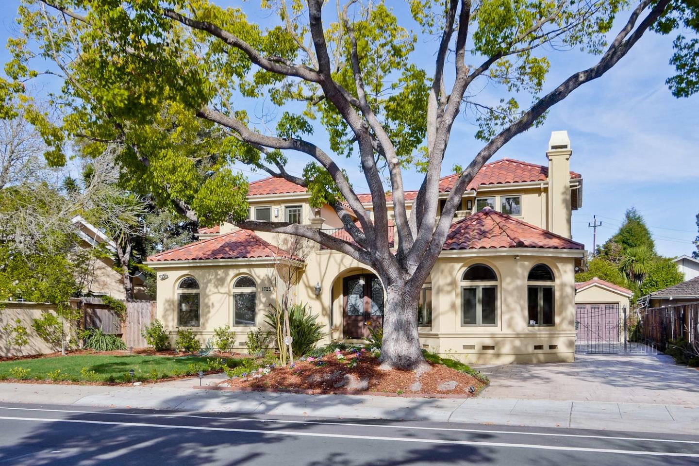1725 Newell Road Palo Alto, CA 94303 - Photo 2 of 47 a front view of a house with garden