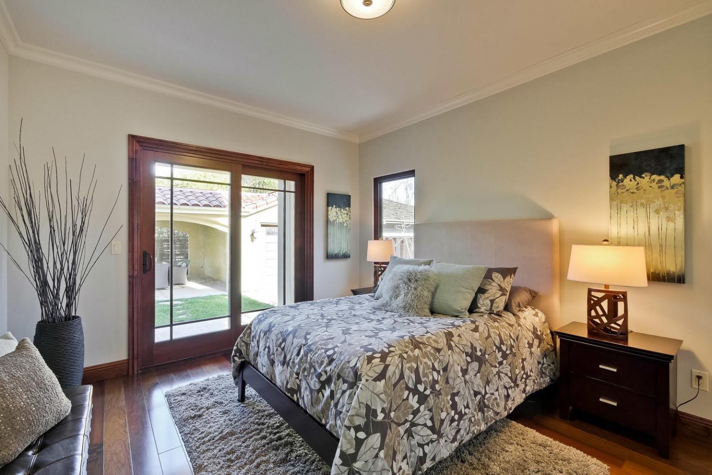 1725 Newell Road Palo Alto, CA 94303 - Photo 26 of 47 a bedroom with a large bed and a window