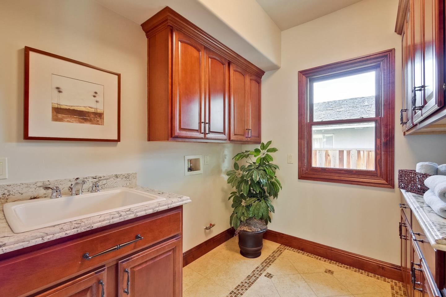 1725 Newell Road Palo Alto, CA 94303 - Photo 35 of 47 a view of bathroom with a potted plant on a sink and a window