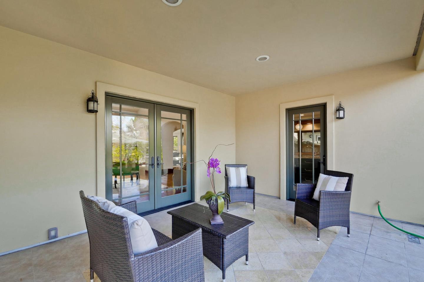 1725 Newell Road Palo Alto, CA 94303 - Photo 39 of 47 a living room with furniture and a potted plant