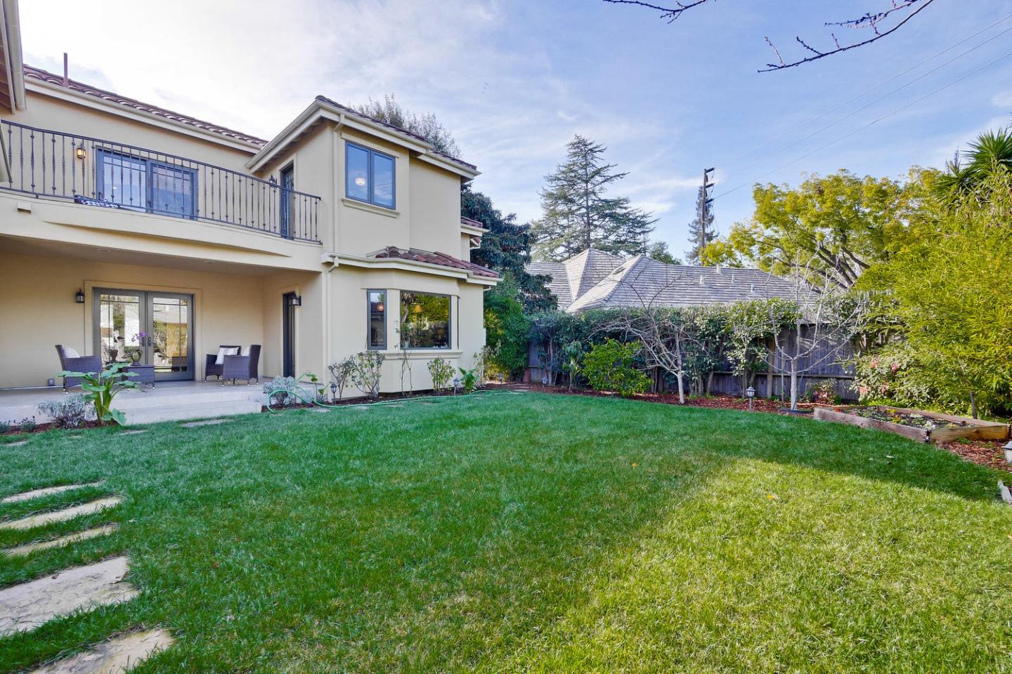 1725 Newell Road Palo Alto, CA 94303 - Photo 42 of 47 a view of a yard in front of the house