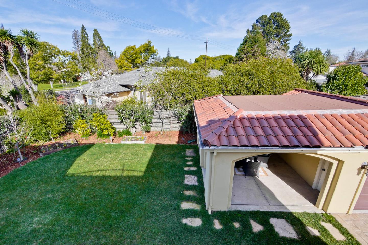 1725 Newell Road Palo Alto, CA 94303 - Photo 44 of 47 a view of a yard in front of the house