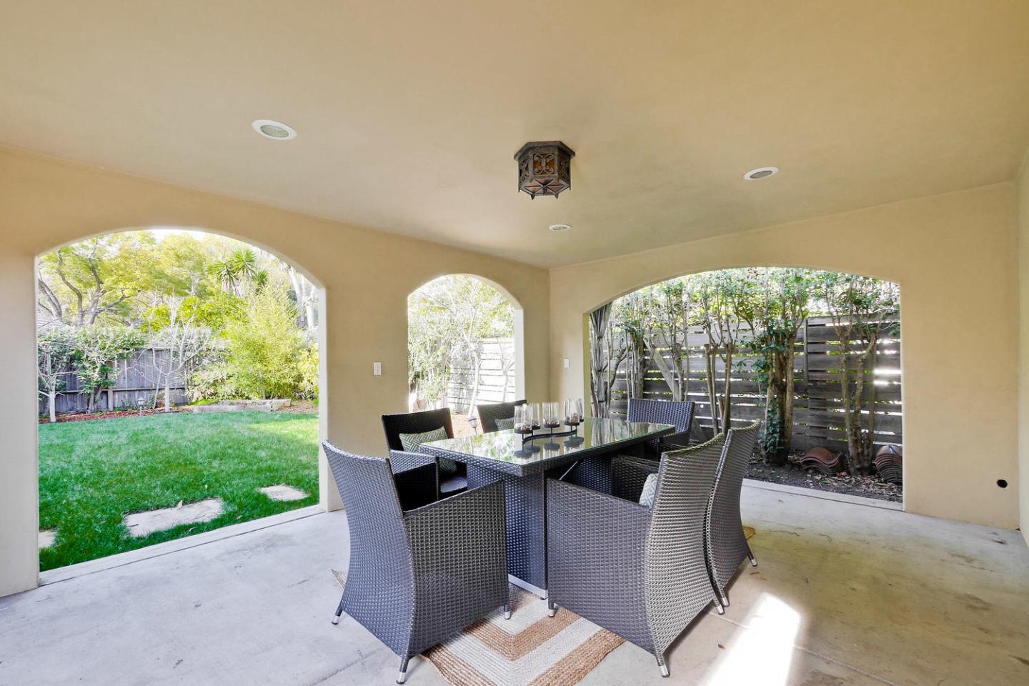 1725 Newell Road Palo Alto, CA 94303 - Photo 47 of 47 a dining room with furniture and a floor to ceiling window