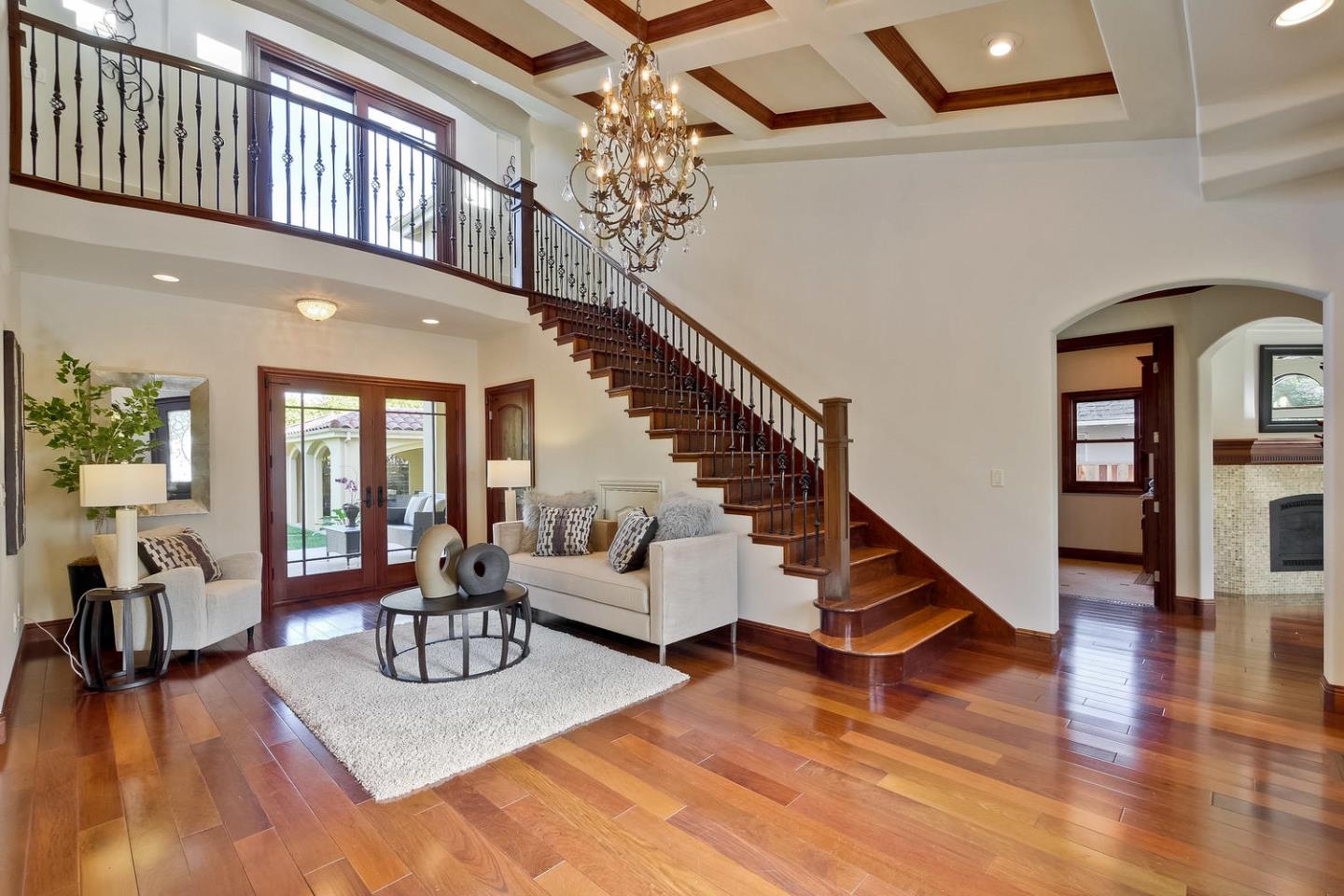 1725 Newell Road Palo Alto, CA 94303 - Photo 6 of 47 a living room with furniture or wooden floor and a chandelier