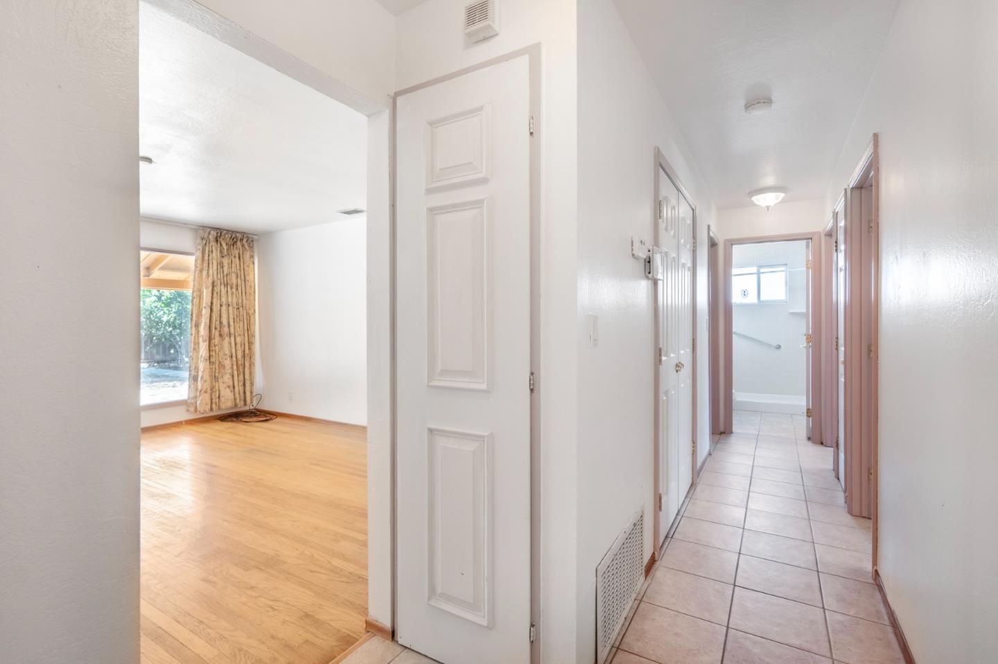 421 Fairview Drive Gilroy, CA 95020 - Photo 11 of 23 a view of a hallway with closet and a bathroom