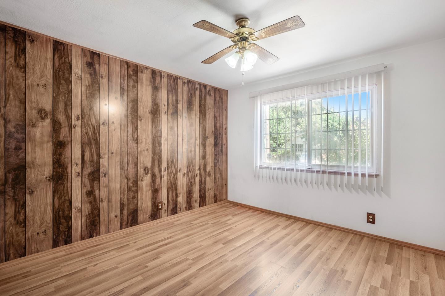 421 Fairview Drive Gilroy, CA 95020 - Photo 14 of 23 a view of wooden floor and a window in a room