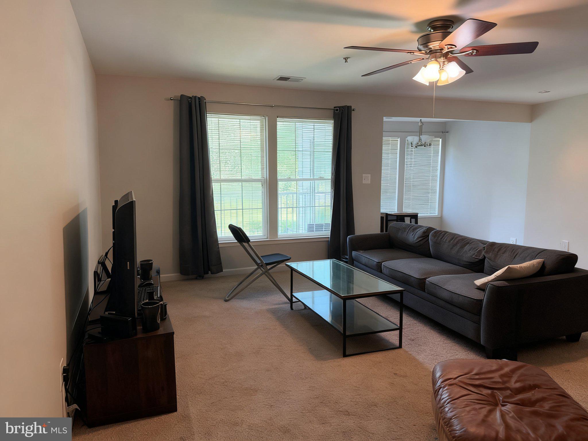 25910 Ridge Manor Drive, Unit G Damascus, MD 20872 - Photo 2 of 31 Large Family Room which opens to Dinning Room
