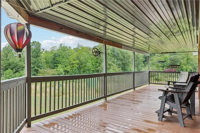 a view of a chairs on the roof deck