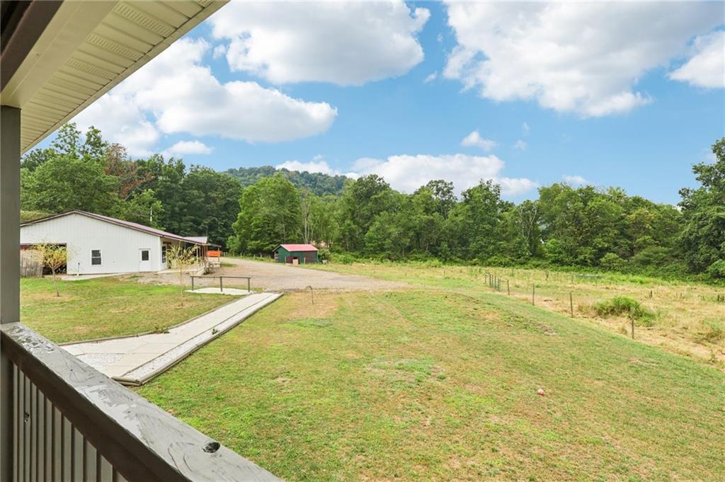 1056 Dora Road Punxsutawney, PA 15767 - Photo 15 of 50 a view of a swimming pool with a yard