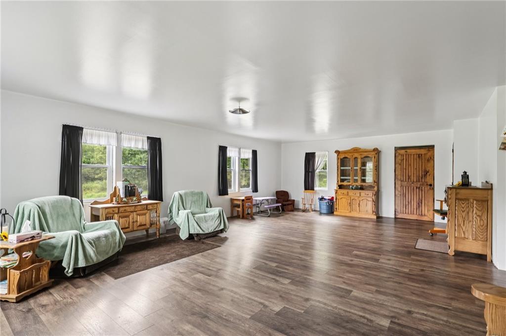 1056 Dora Road Punxsutawney, PA 15767 - Photo 22 of 50 a living room with furniture and wooden floor